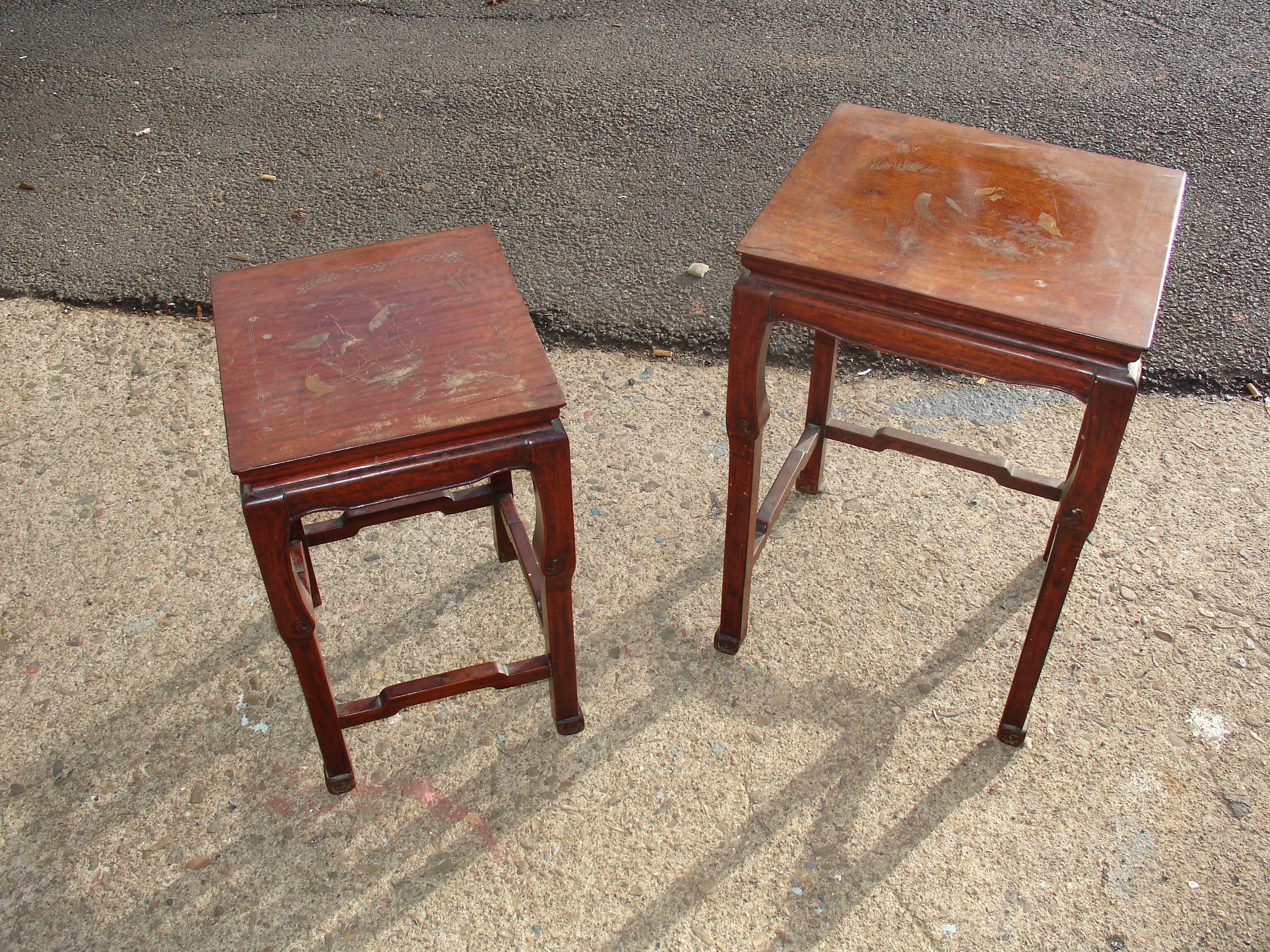Nesting tables in ironwood with engraved decoration and gold highlights