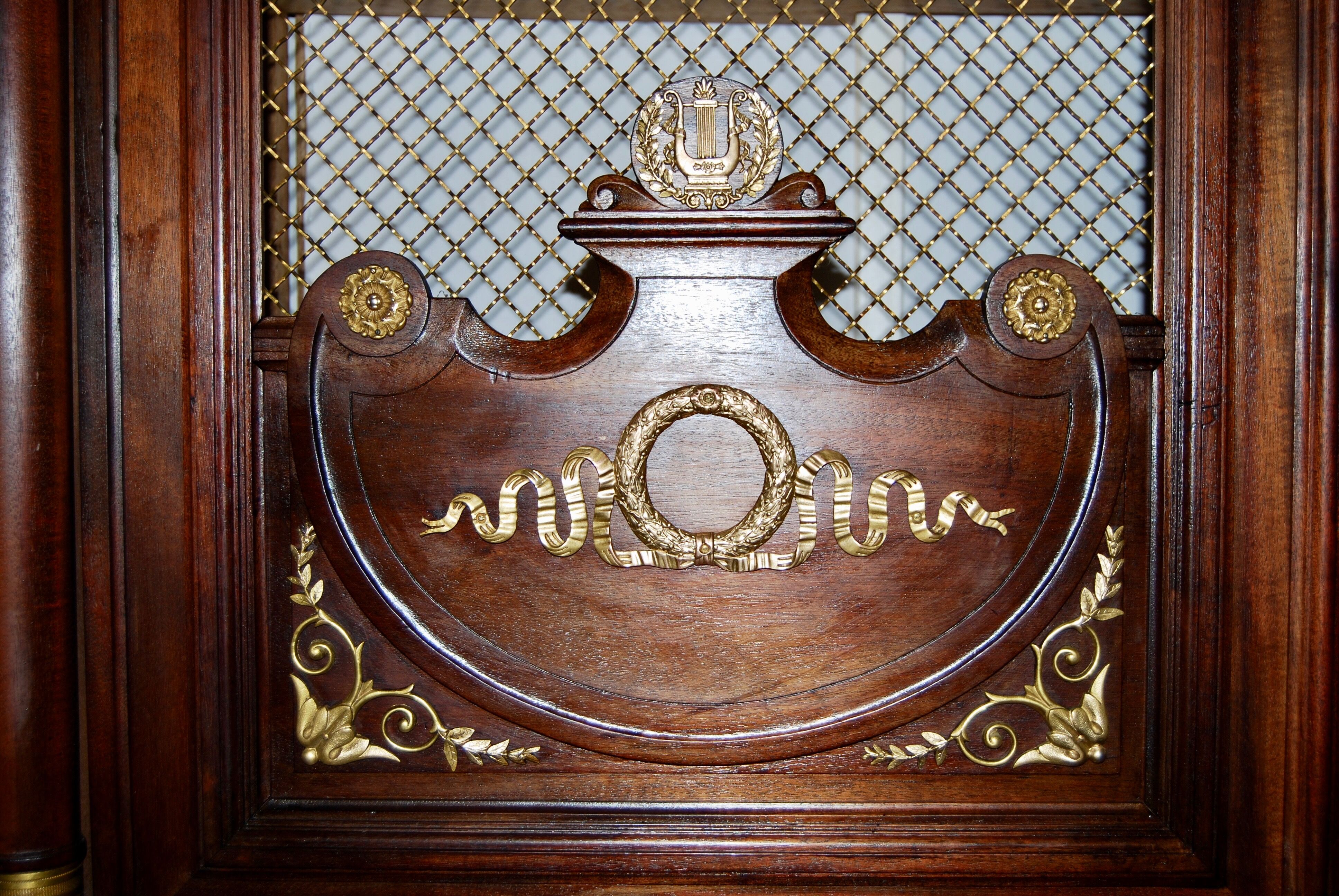 Large Empire library in solid mahogany, late nineteenth century