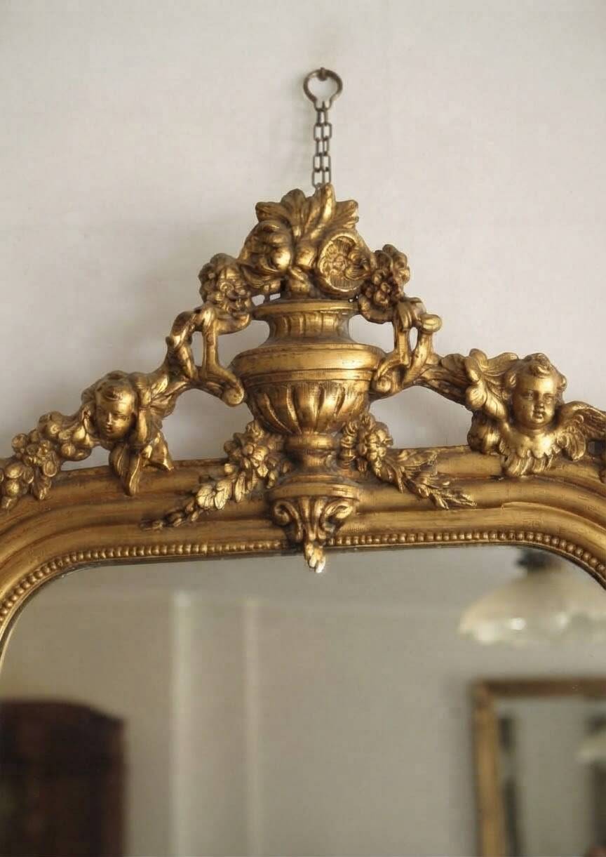 Gold wall mirror from the early 20th century.