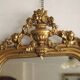 Gold wall mirror from the early 20th century.