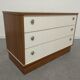 Low chest of drawers with 3 drawers in mahogany and white satin, France circa 1980.