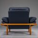 Danish teak and navy blue leather lounge chair from Komfort, 1970s