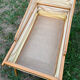 Wooden designer travel cot