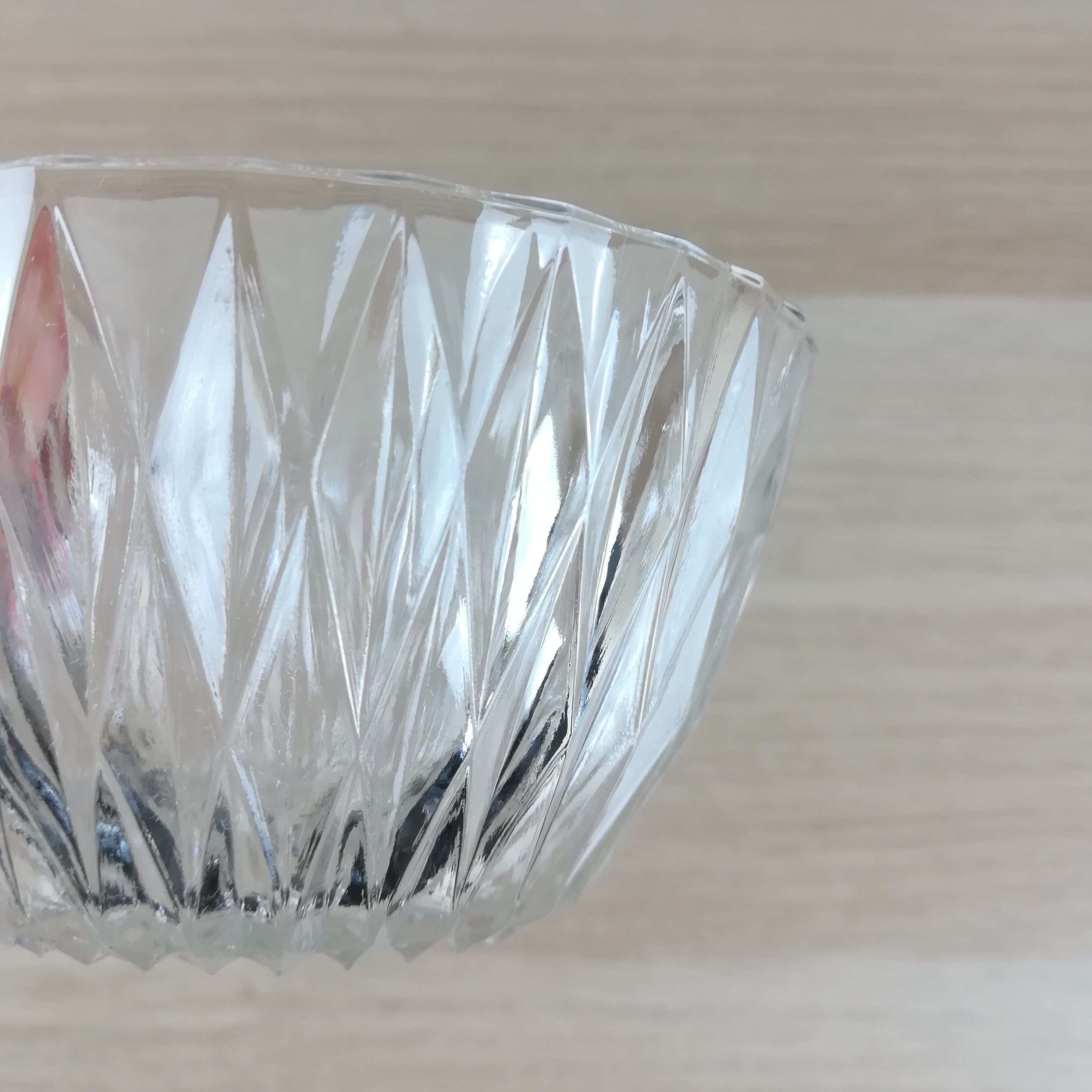 2 faceted glass cups