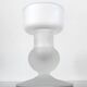 Sculptural candle holder in frosted glass.