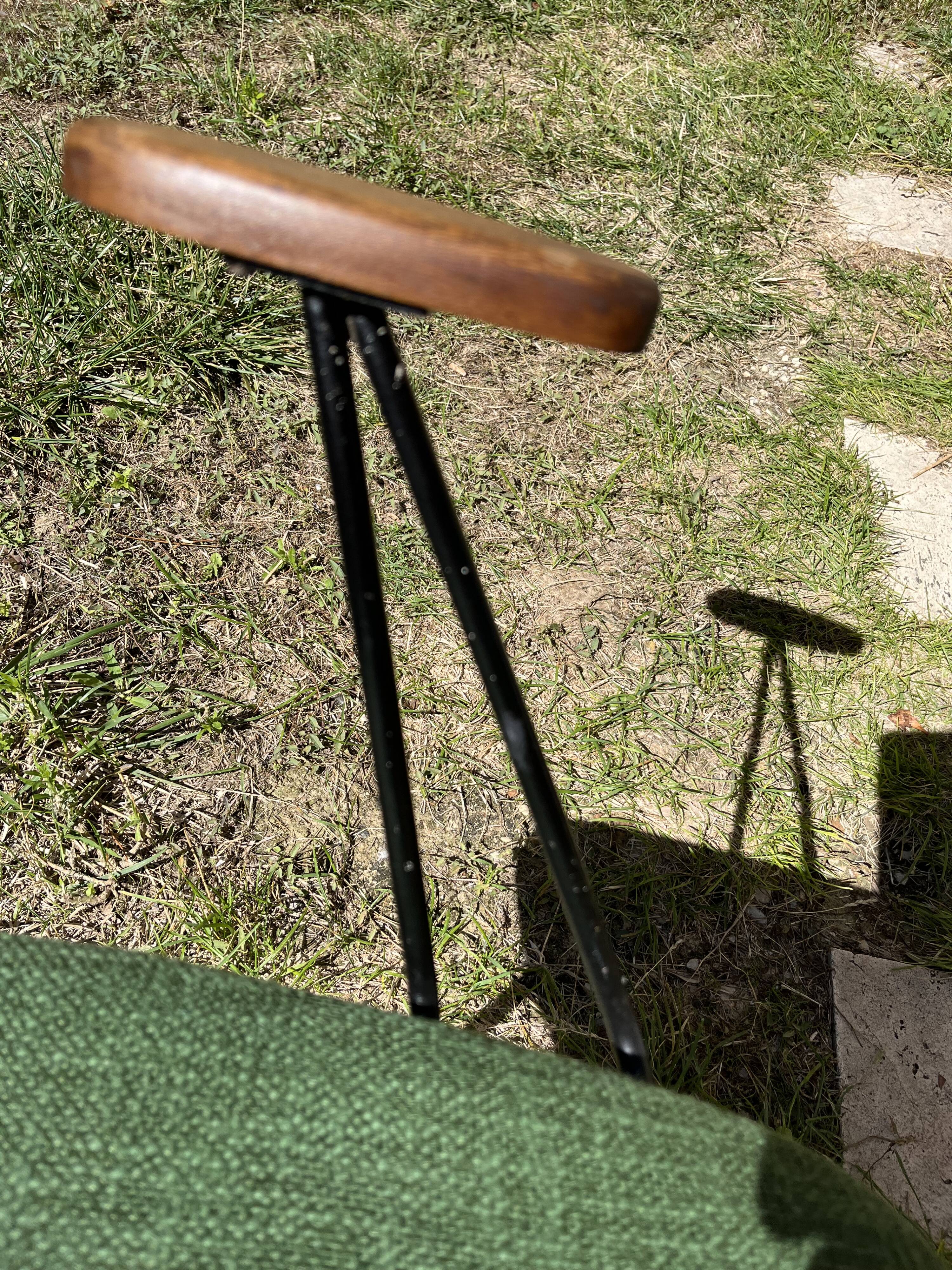 50s chair with armrests.