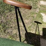 50s chair with armrests.