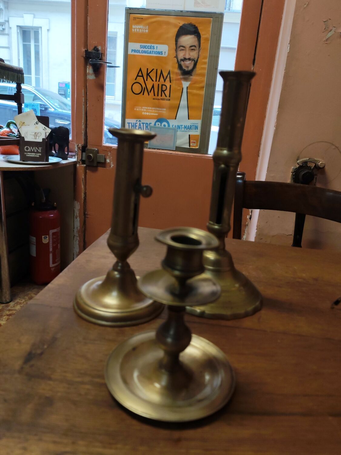 Set of three solid brass candle holders