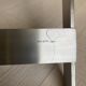FOLDING STOOL KNOWN AS "PLOYANT" IN BRUSHED STEEL AND LEATHER, SIGNED AMAURY WATINE