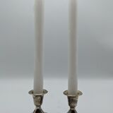 Pair of silver metal candlesticks