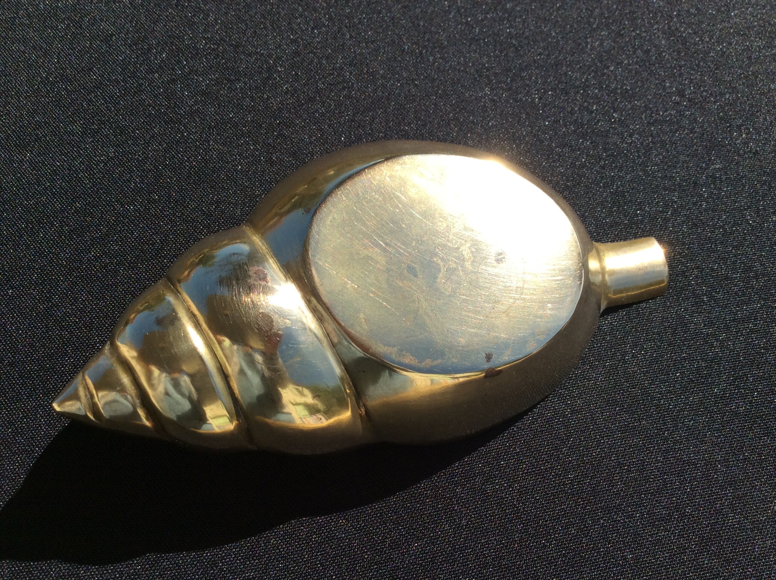 Shell brass ashtray