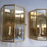 Pair of wall sconces in gold-plated brass with bevelled glass, Italian.