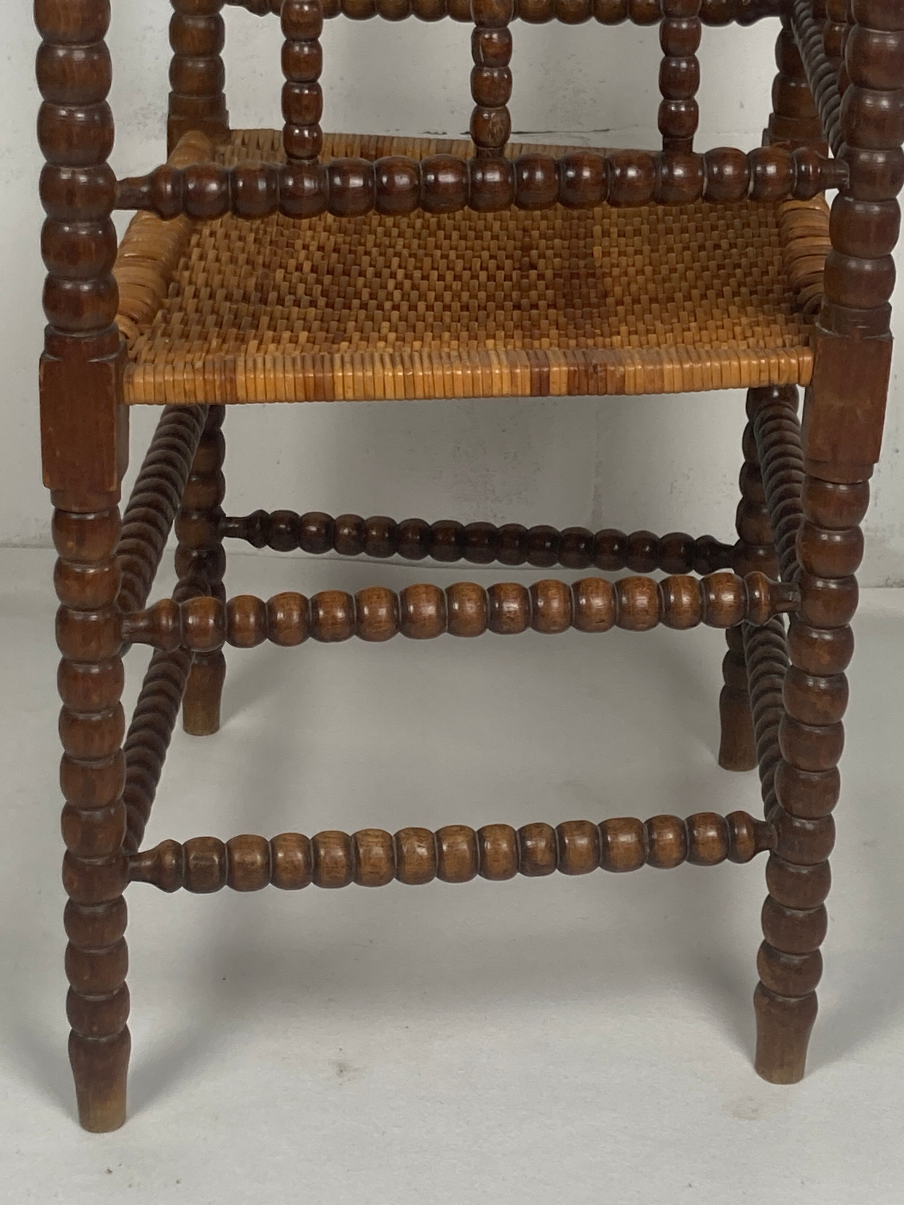 Fauteuil en osier et en bois tourné, années 1930 - 1950