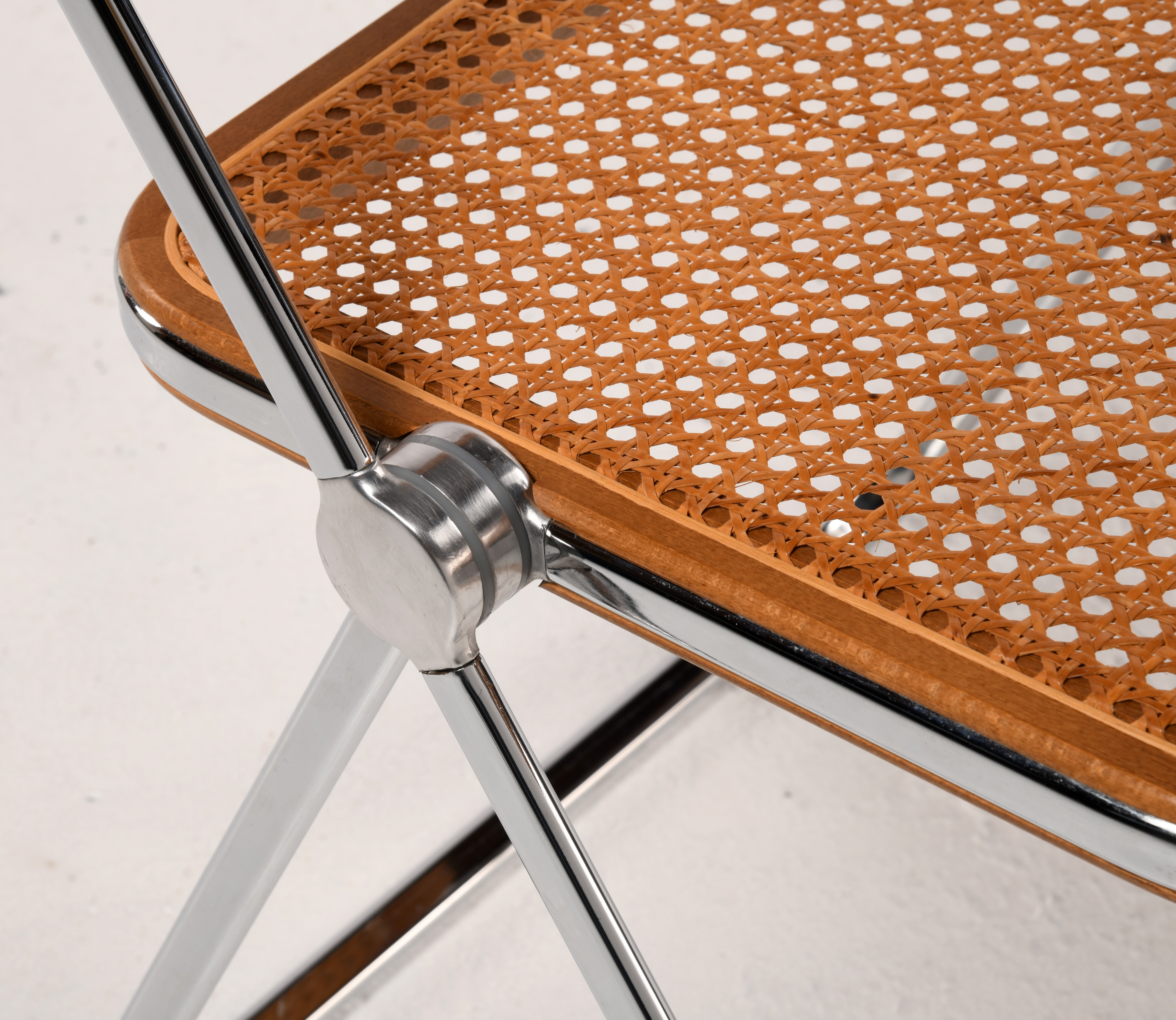 Plia cane chair Giancarlo Piretti Castelli
