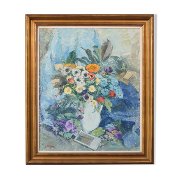 Nature morte avec fleurs et photographie