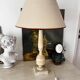 Antique lamp with a marble base.