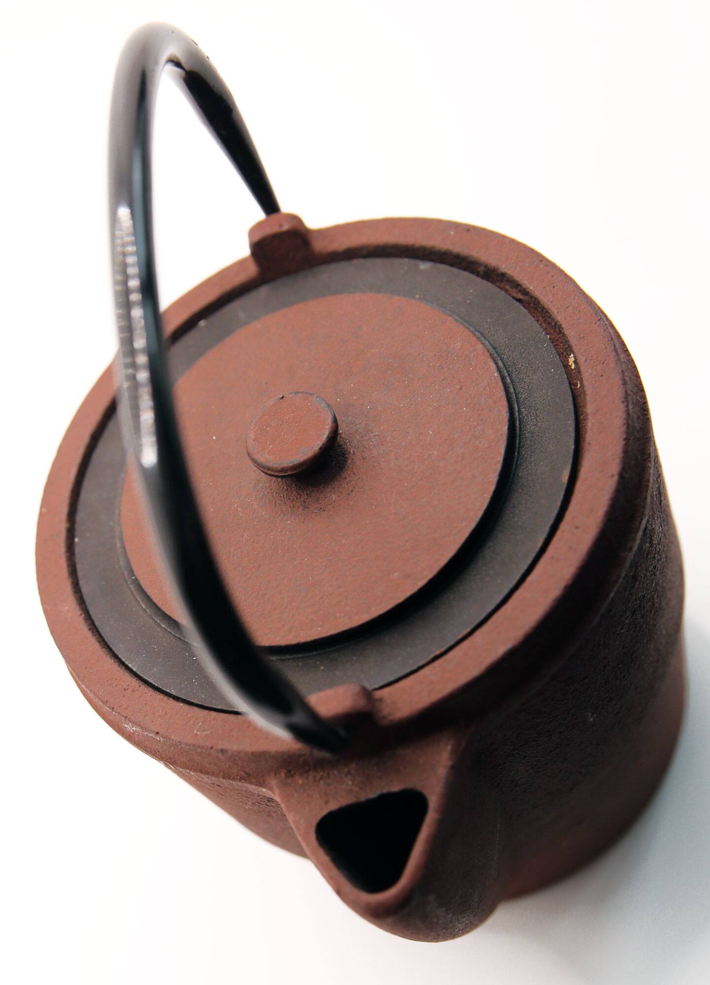 Cast iron chocolate teapot from Japan wabi sabi and its stainless steel filter
