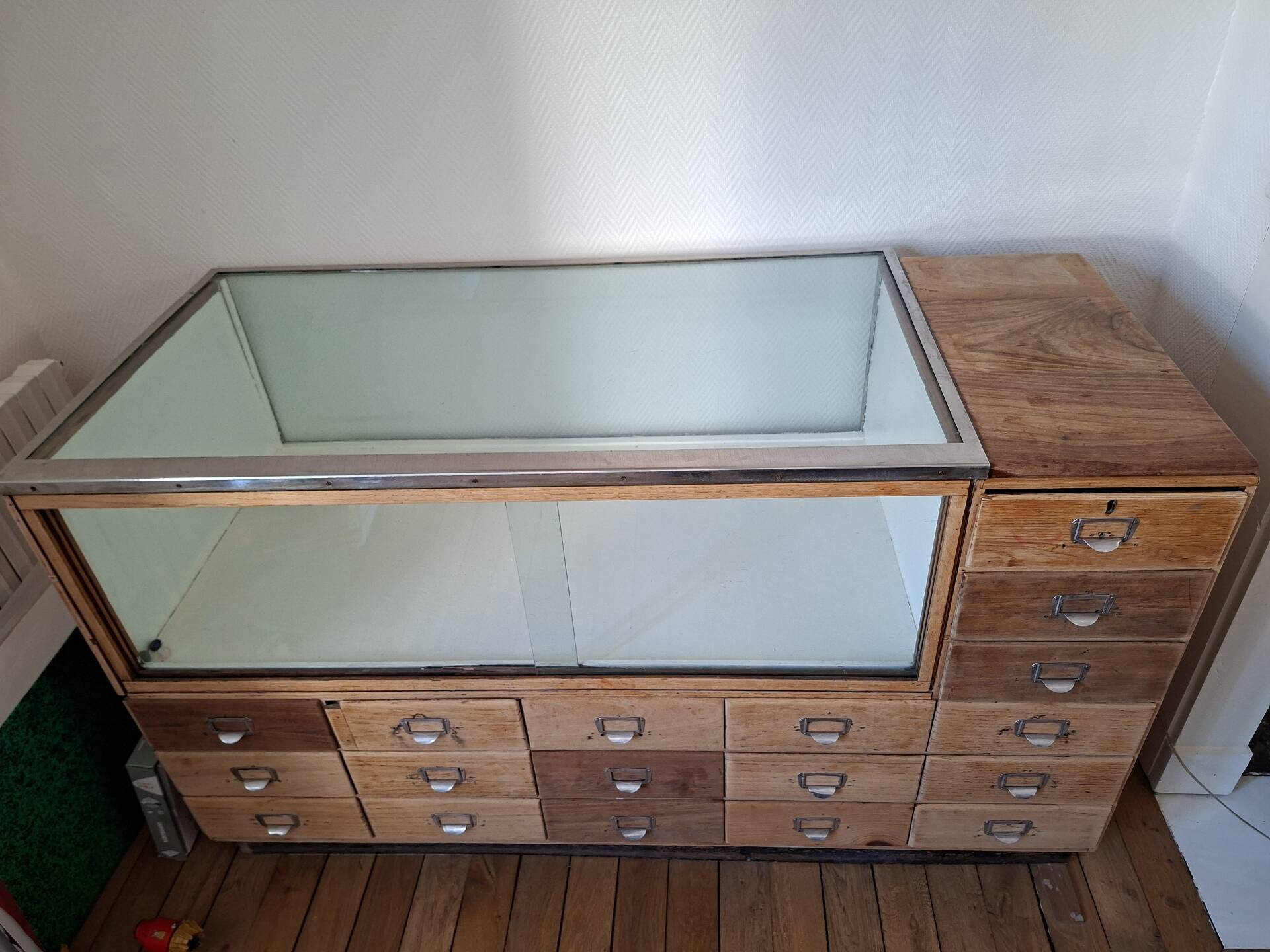 Old workshop furniture (hardware) with drawers from the early 20th century.