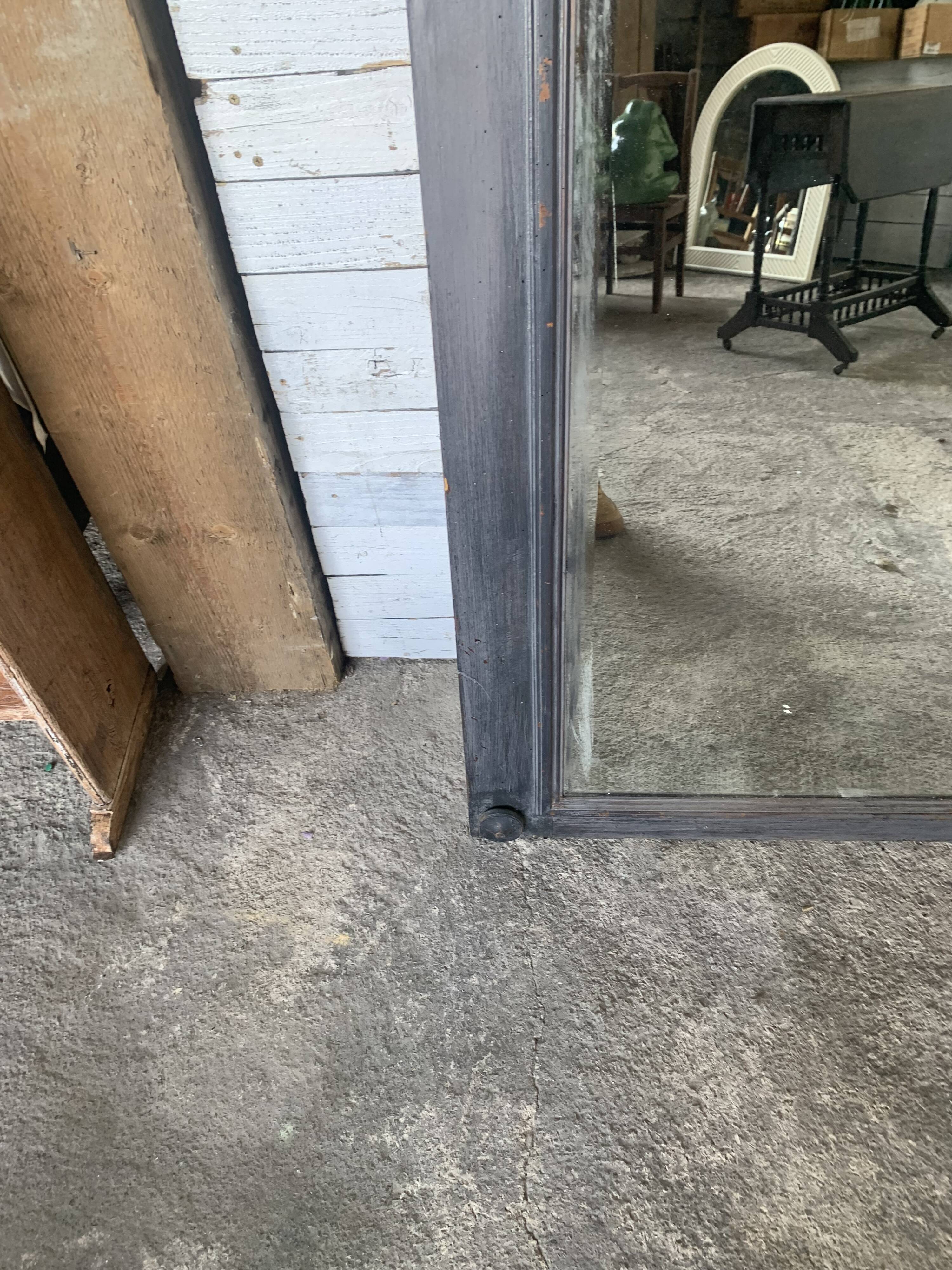 Wooden mirror with juice patina