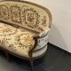 Sofa in walnut with basket shape from the Louis XVI period circa 1780