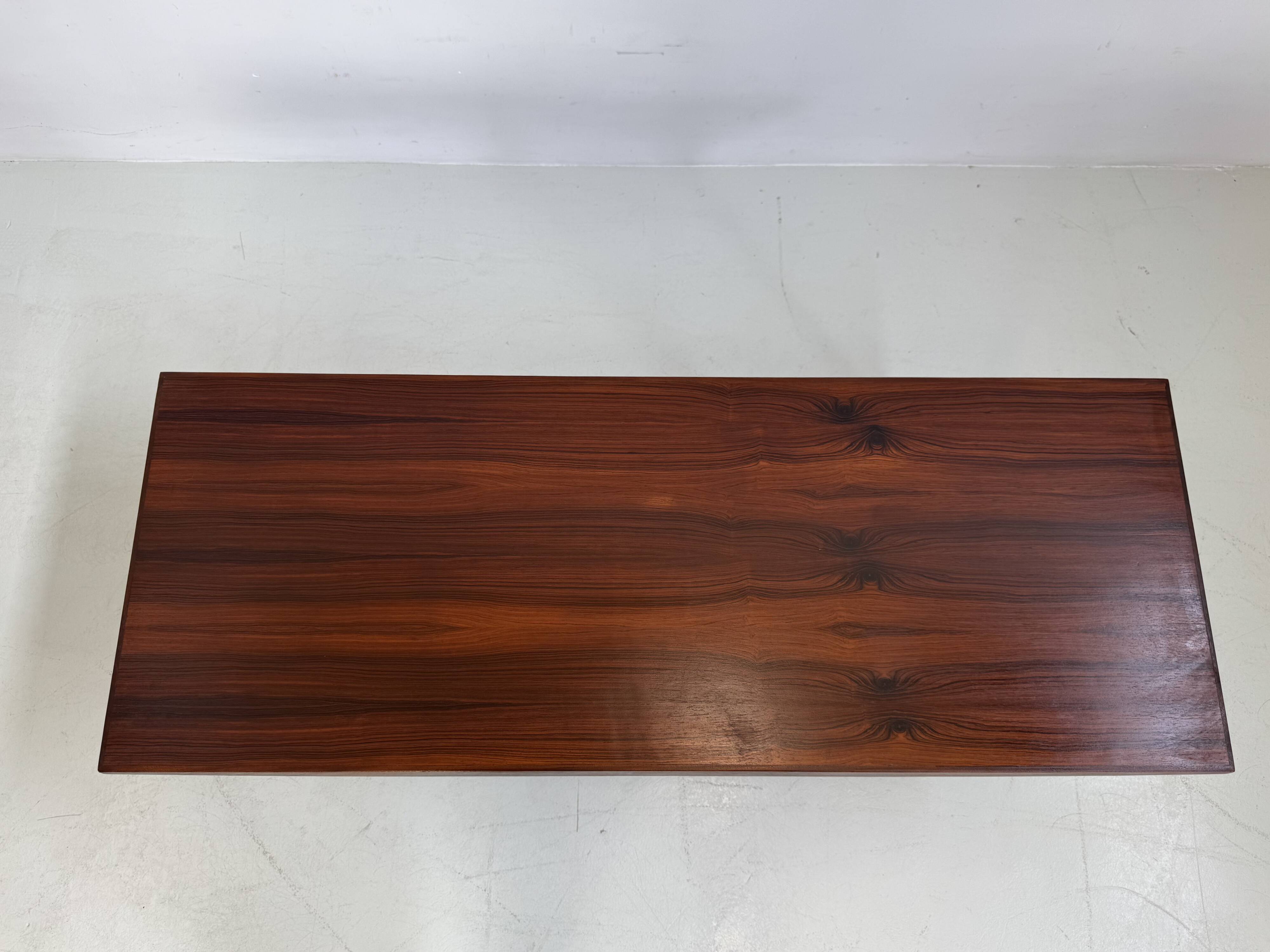 Beautiful compact design coffee table made of rosewood from the 1960s.