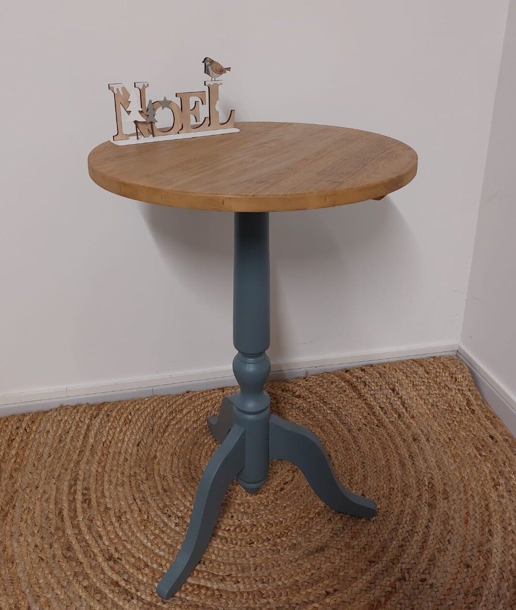 Gray and natural pedestal table