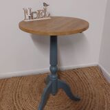 Gray and natural pedestal table