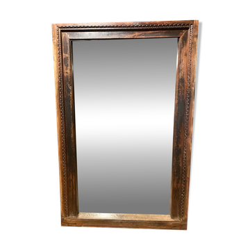 Mirror in old wooden frame
