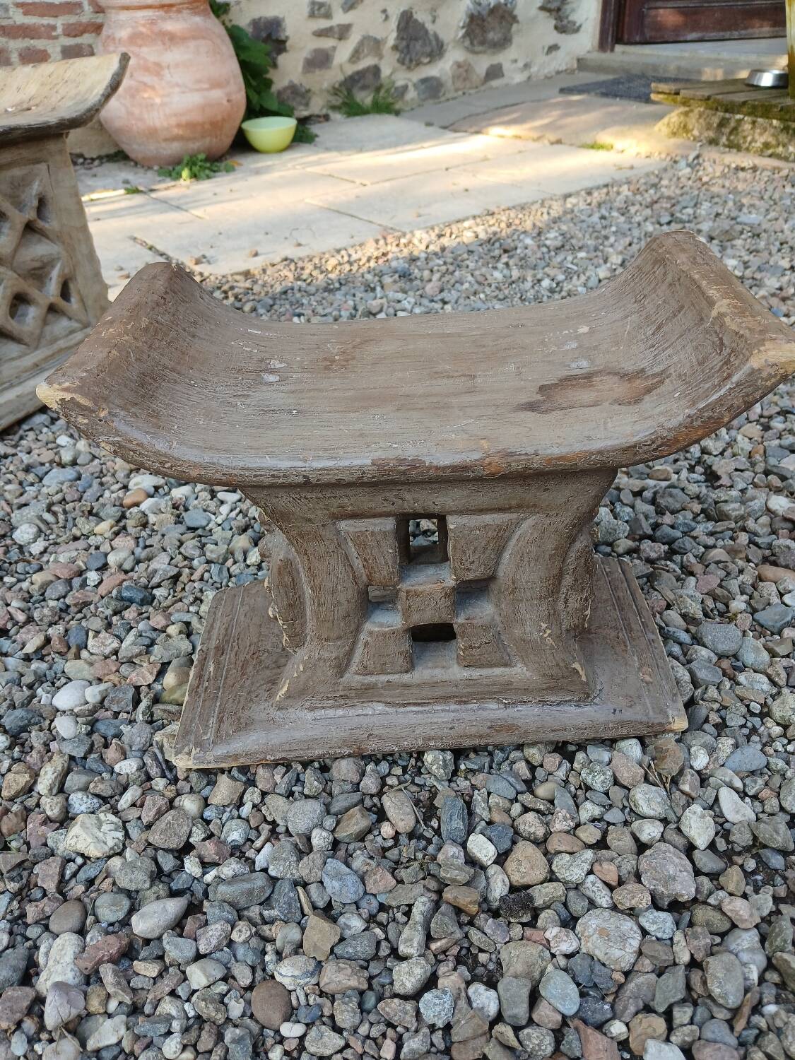2 African carved wooden stools