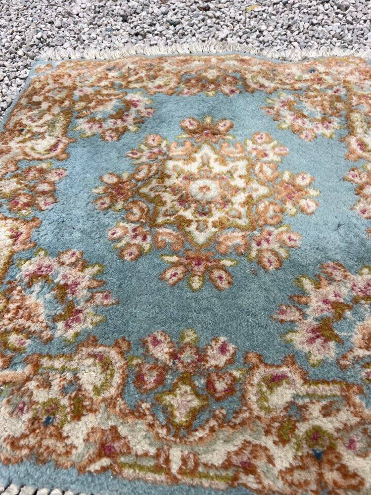 Small antique Persian rug