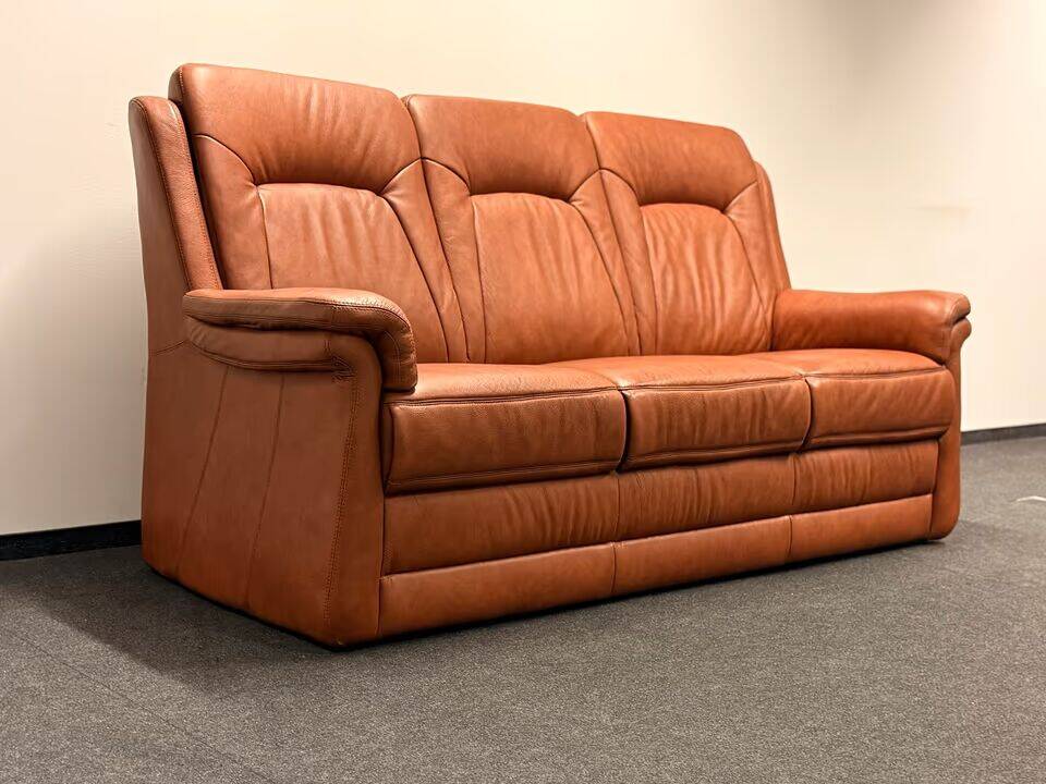 Leather  2-piece set-sofa and armchair from Elastoform