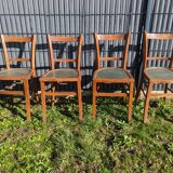 Set of four wooden bistro chairs, green seat, mid-20th century.