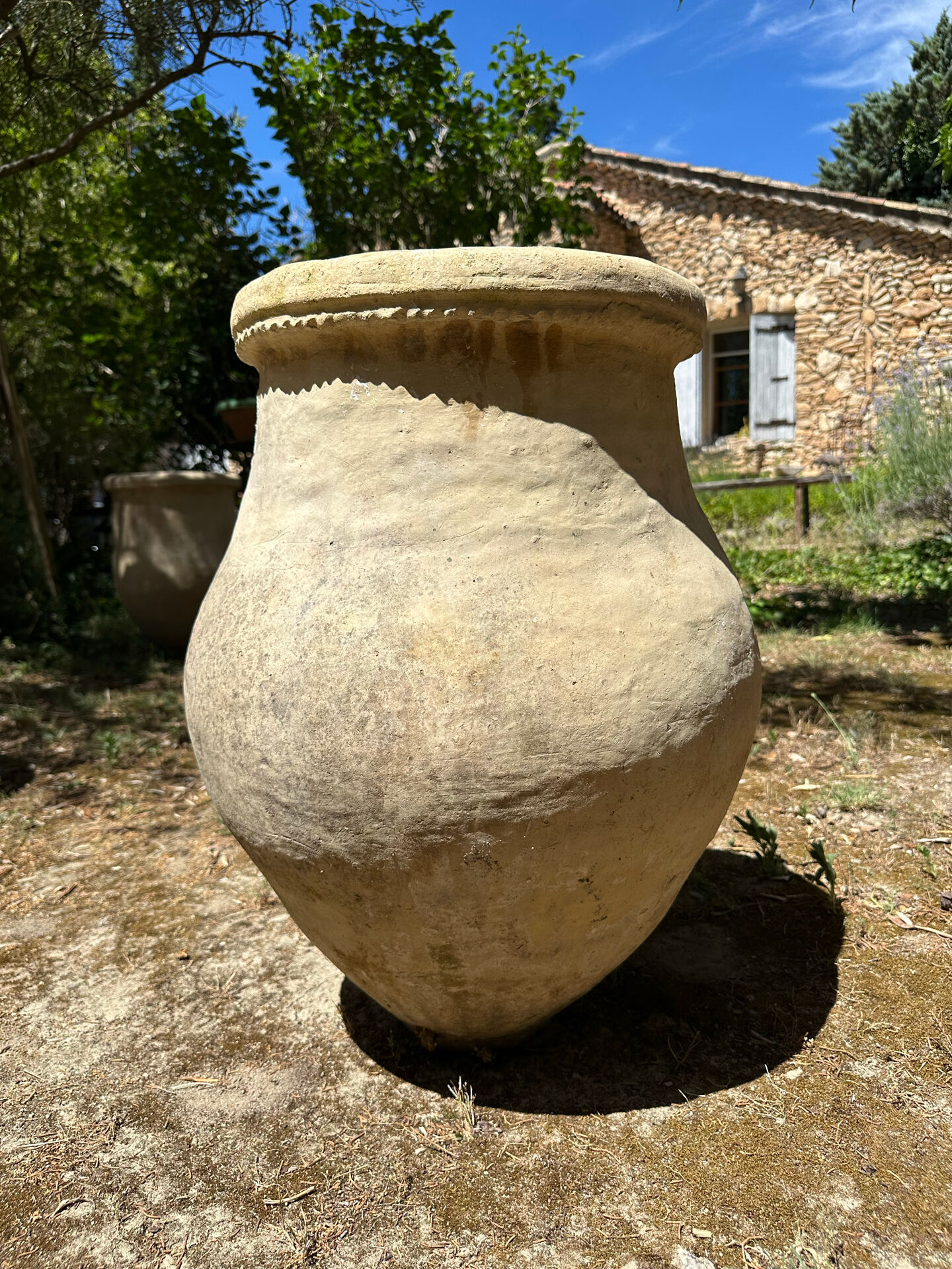 Ancient terracotta pottery jar