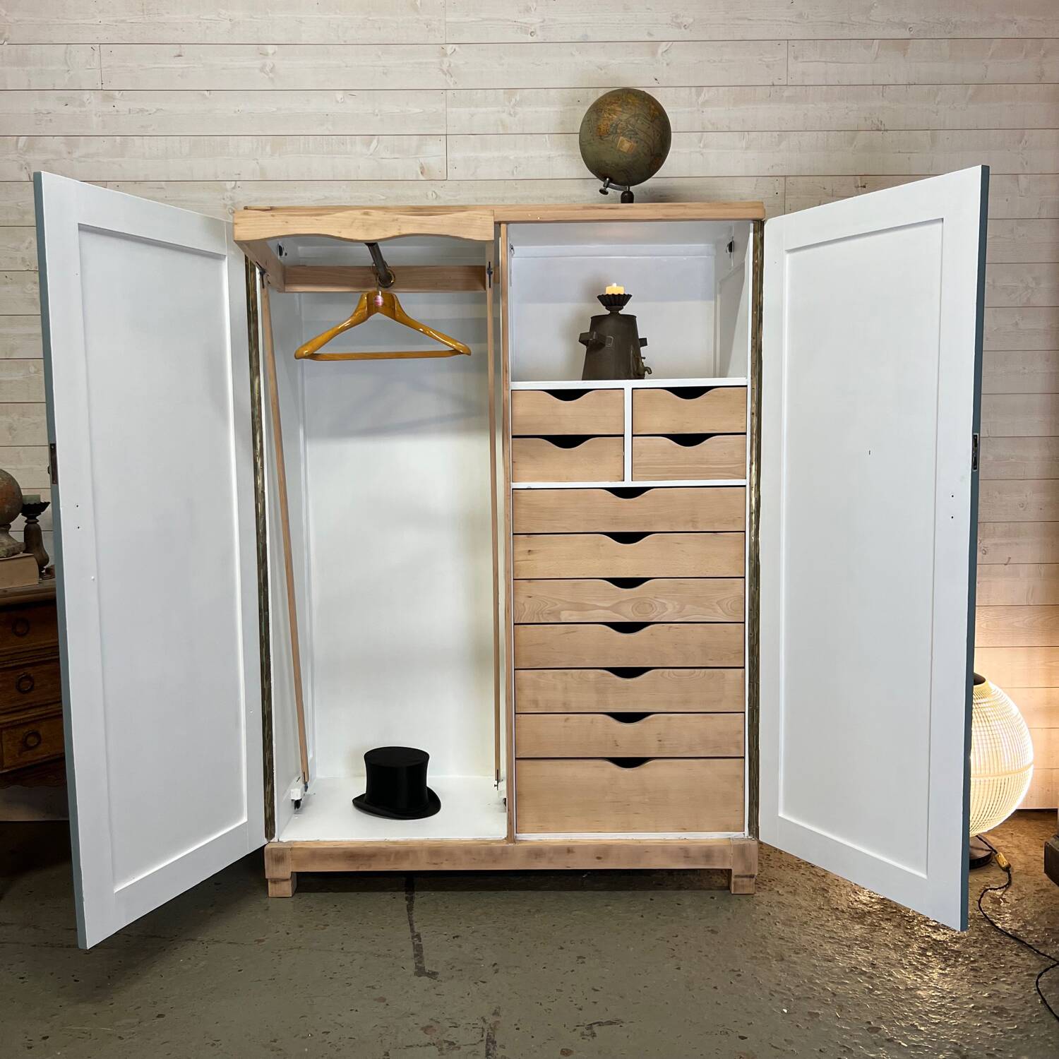 Wardrobe with two wardrobe compartments and drawers