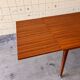 Extendable dining table in teak