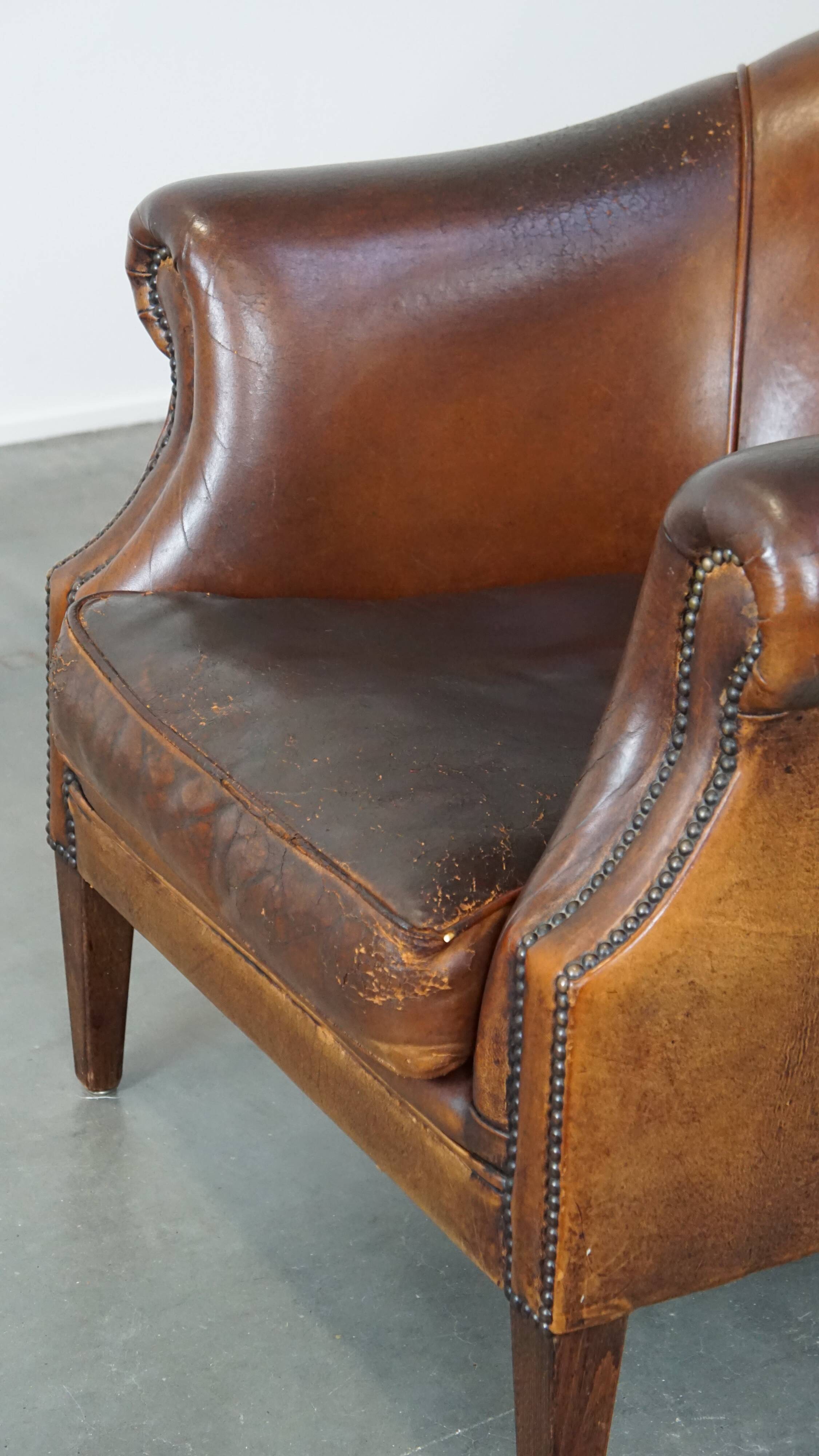 Vintage club armchair in sheepskin leather