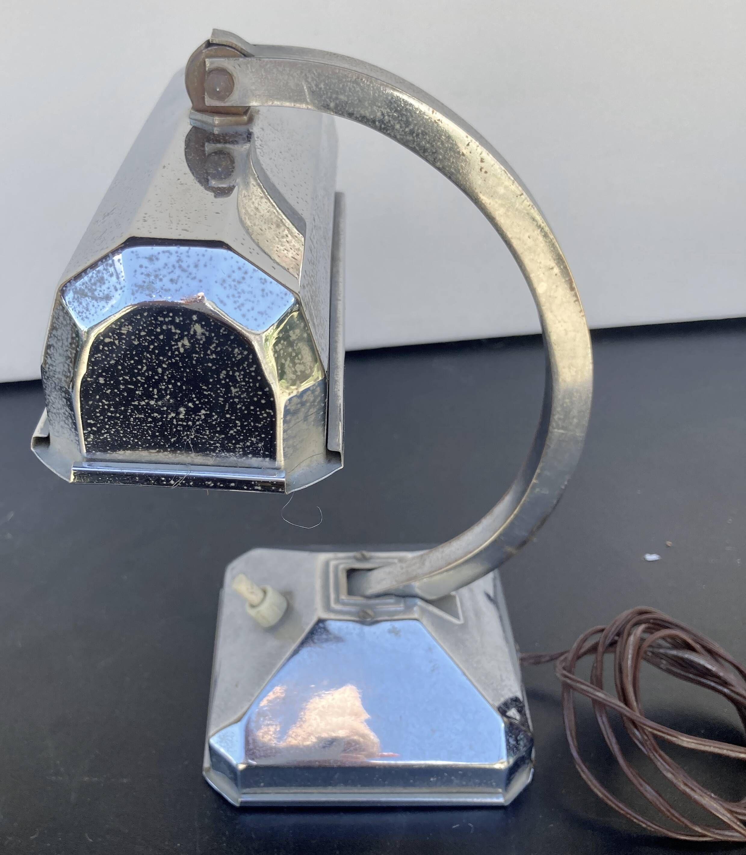 Small Pirouett Art Deco lamp with a chrome base.