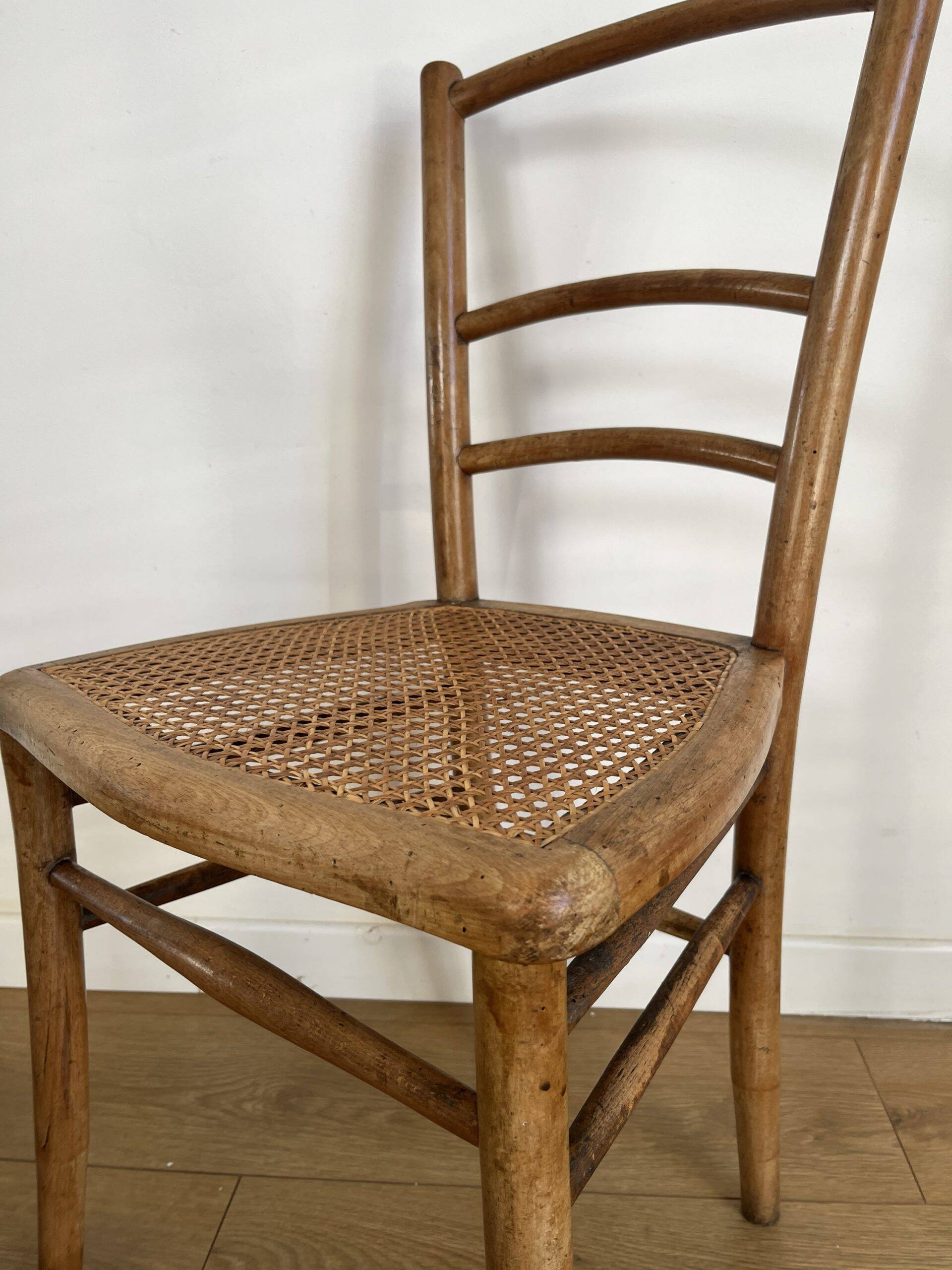 Pair of caned bistro chairs