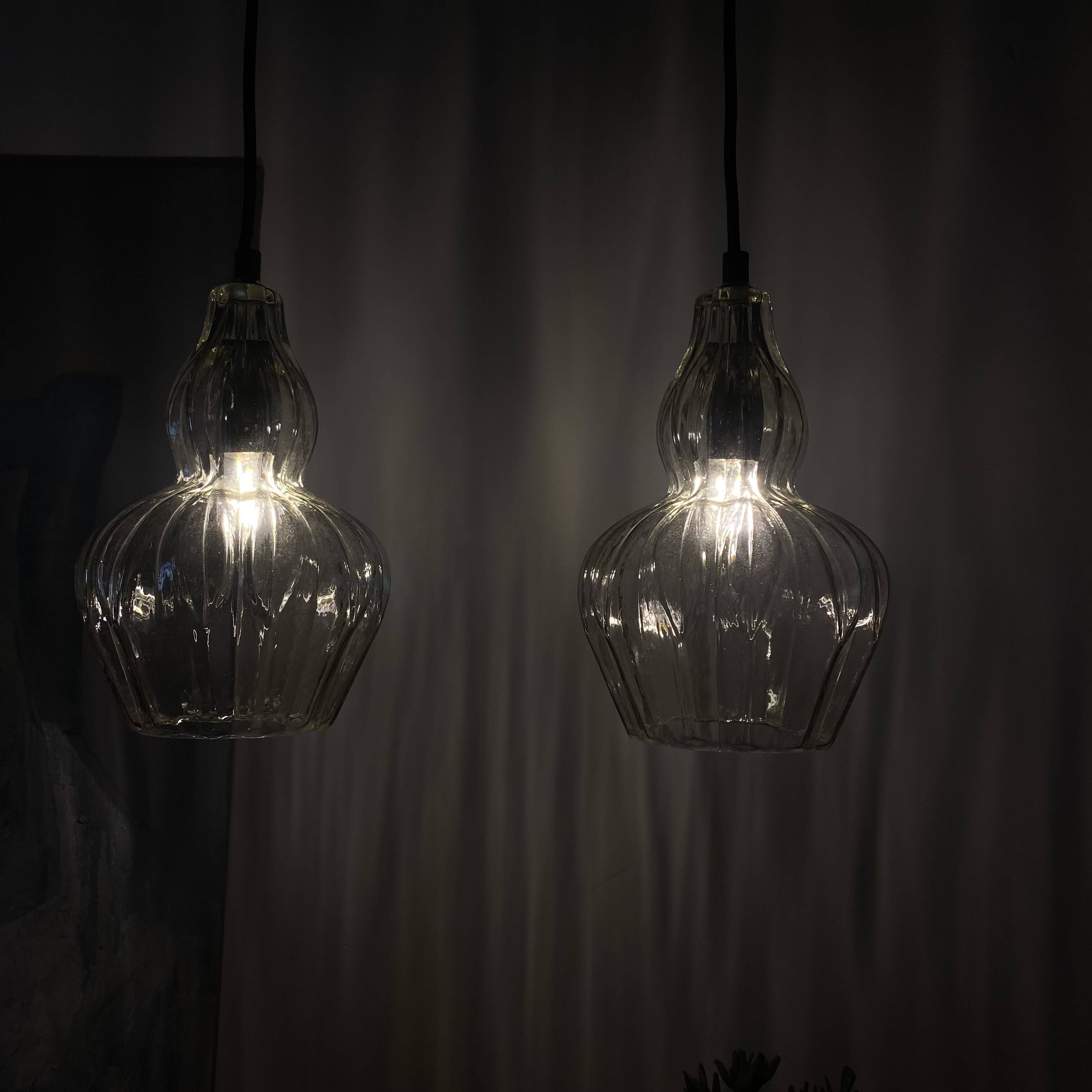 Pair of vintage glass pendant lights.