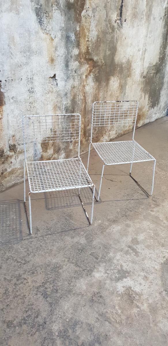 Two vintage metal chairs