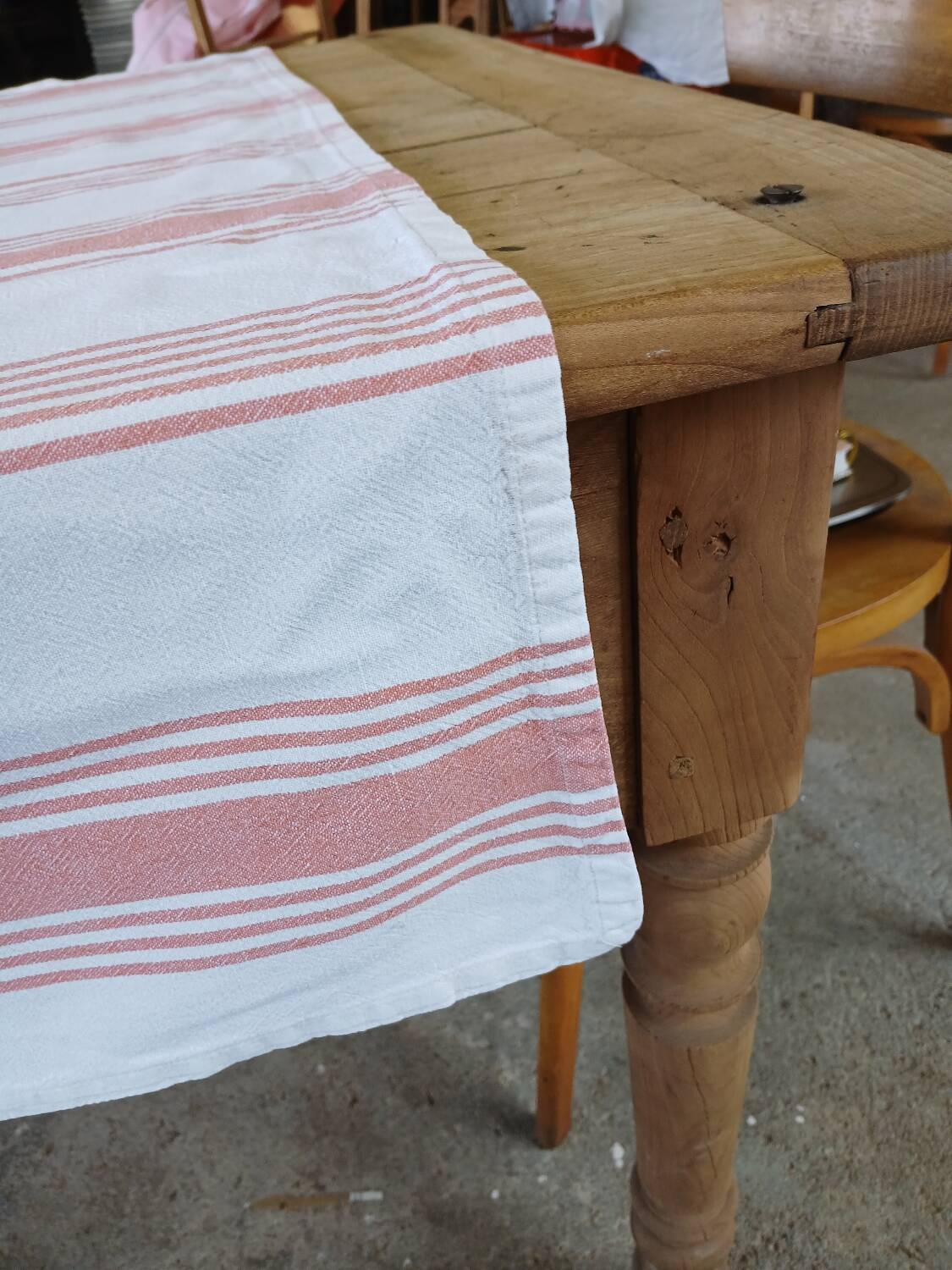 Old pink and white tablecloth