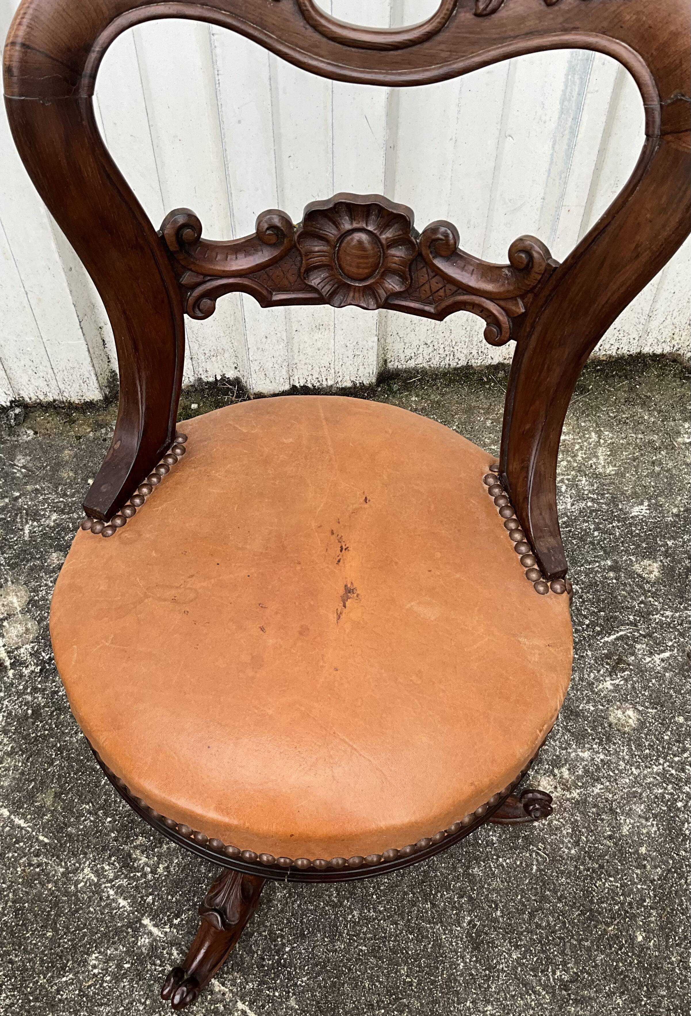 Mid-19th century solid walnut harpist's chair