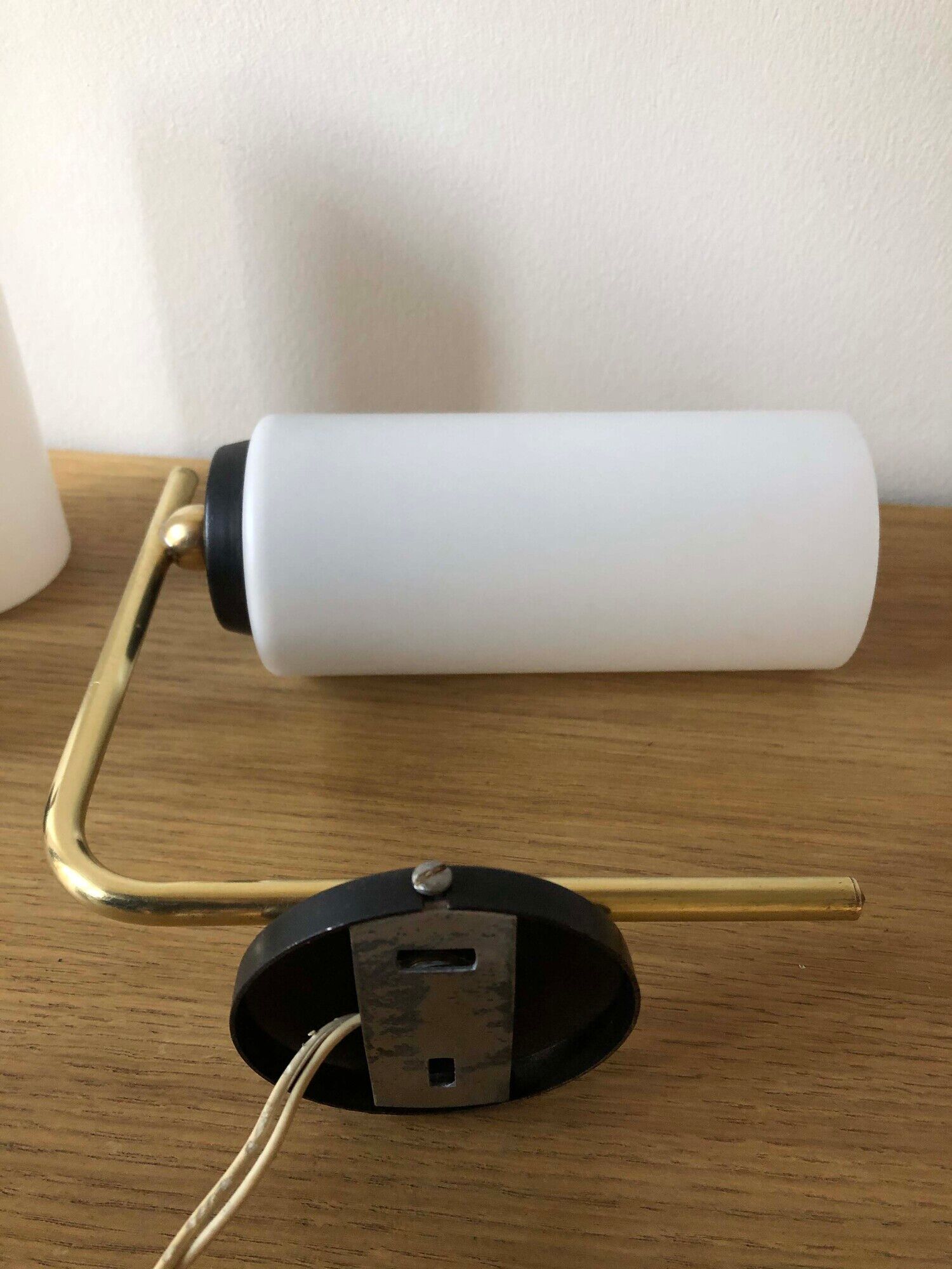 Pair of brass tube wall light and 1960s opalin glass