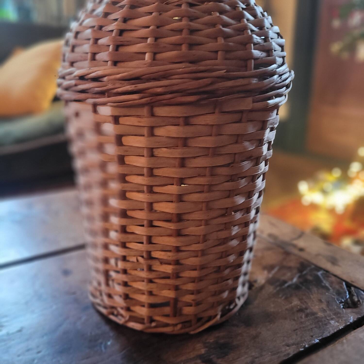 Glass demijohn encased in wicker, 1950s–1960s