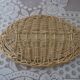 Small oval wicker mirror