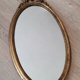Oval golden mirror 41x23
