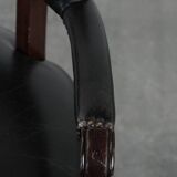 Adjustable black timeless Chesterfield office chair made of cow leather