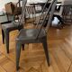 Pair of vintage Tolix model A chairs, designed by Xavier Pauchard.