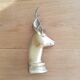 Press book in the shape of a deer