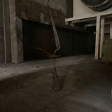 Signed hammered metal and copper sculpture